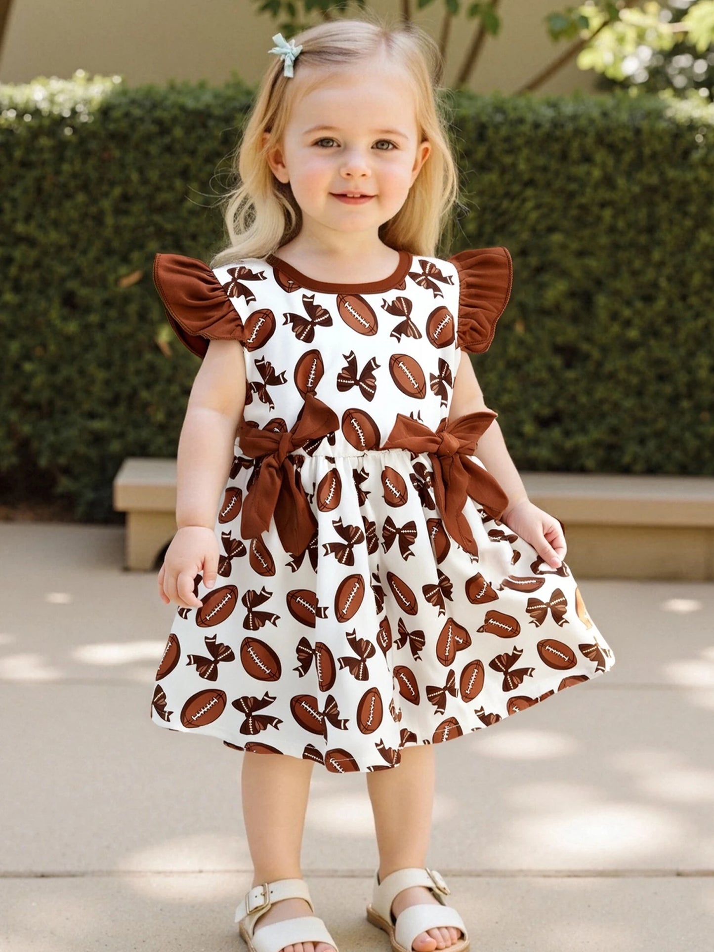 Girls Summer A-line Dress with Flutter Sleeves and Round Neckline featuring Rugby Print Design and Bow Embellishment