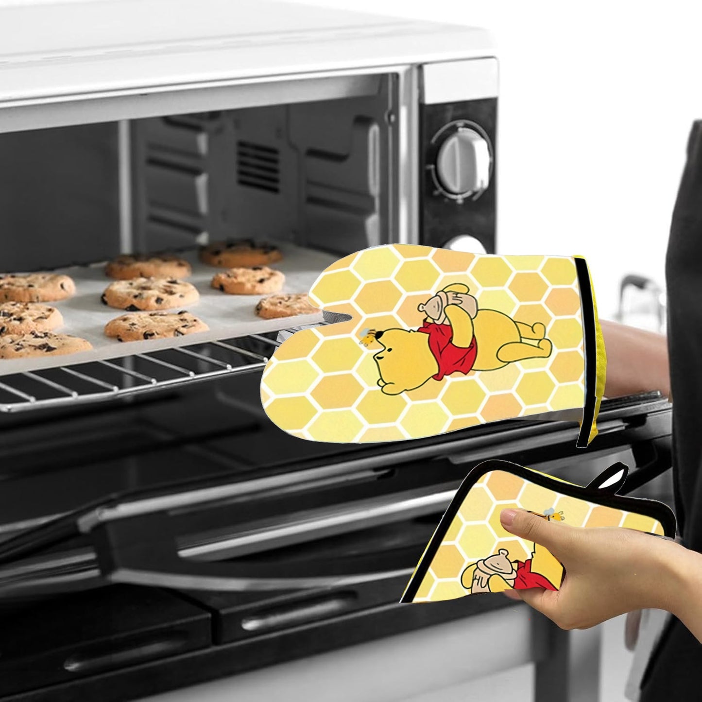 Winnie the Pooh Kitchen Set, including a cartoon apron, heat-resistant gloves, and a heat-resistant mat, bringing joy to your culinary creations.,  Playful Kitchenware, Cheerful Kitchen, Kitchen Gift Set