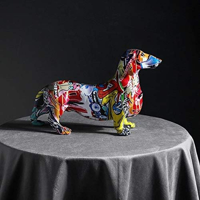 A Decorative Sculpture of a Dachshund Dog, Designed As Graffiti Art, Perfect for Enhancing The Aesthetic of Your Living Room, Bedroom, Bookshelf, TV Cabinet, Or Desk. It Serves As a Charming Centerpiece Or Ornament