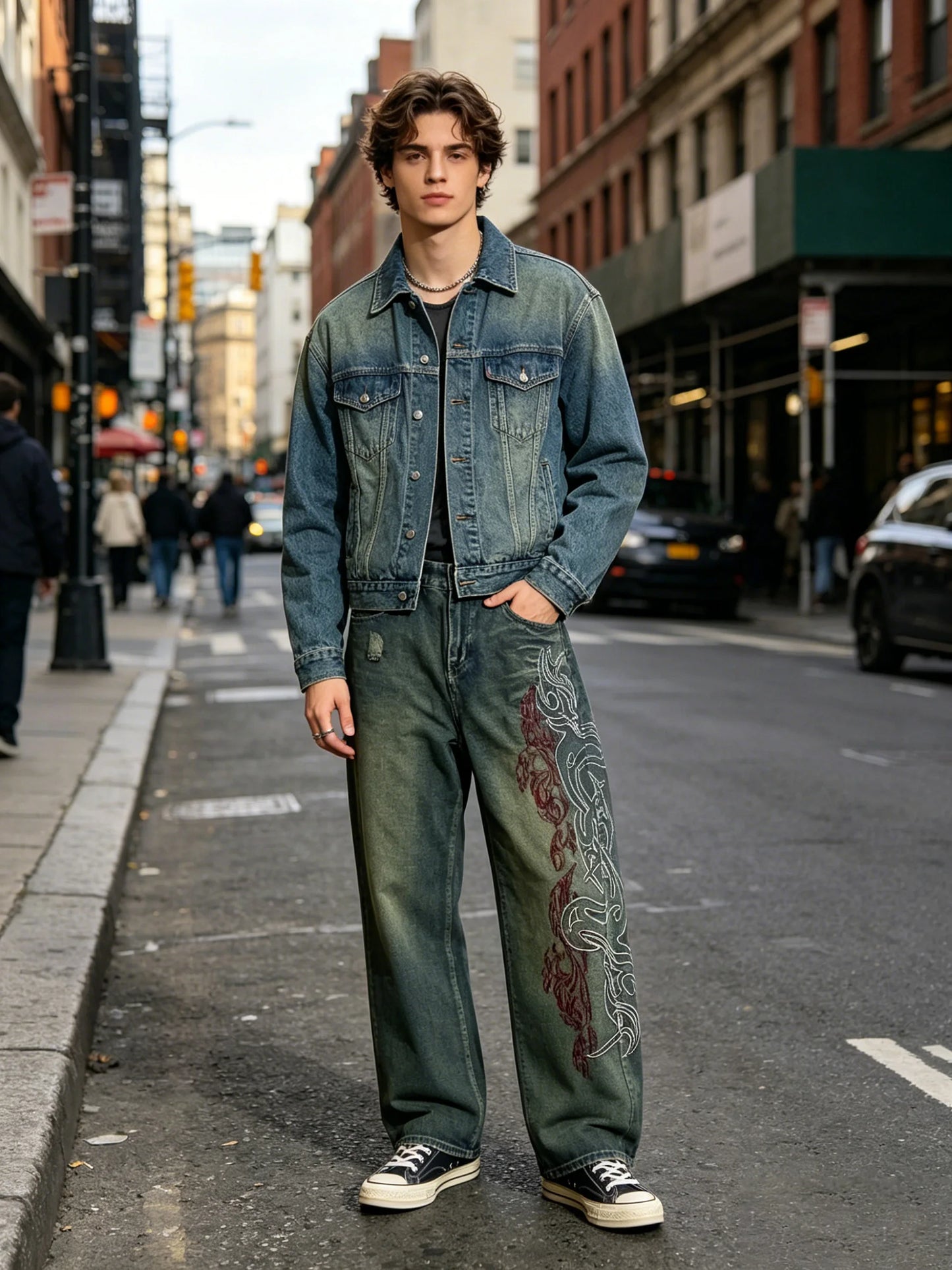 Vintage-style high-waisted wide-leg jeans with side print, distressed finish, loose straight leg, casual and stylish.