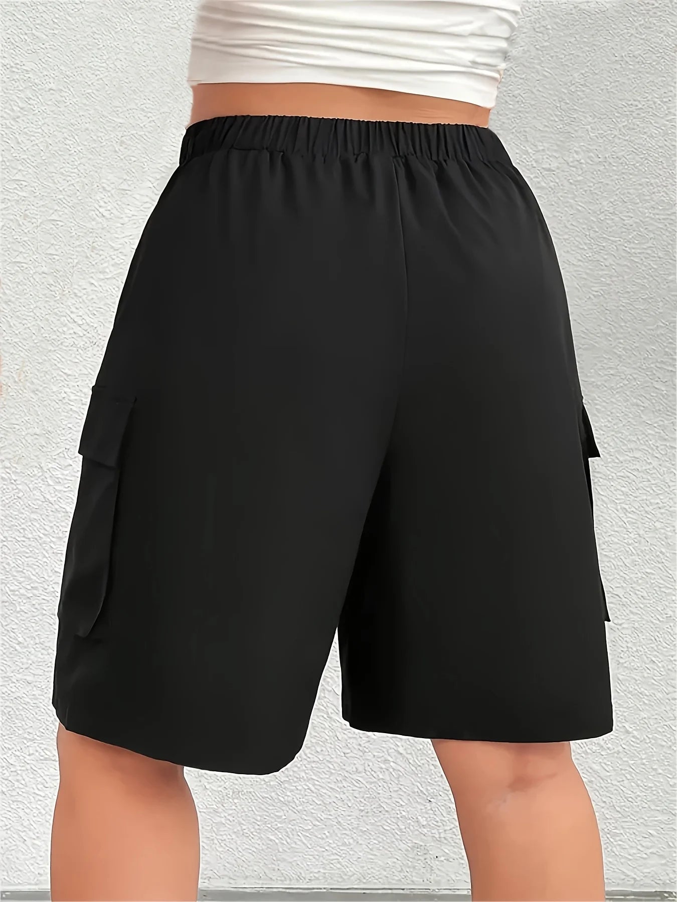 European and American plus size women's black elastic waist multi-pocket cargo shorts; loose wide-leg side 3D large pocket casual sports knee-length