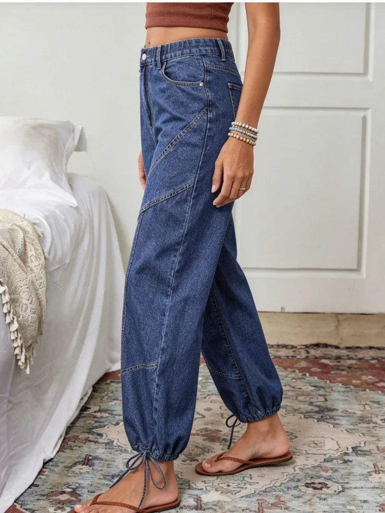 2026 new style women's work pants, soft washed high-waist stitched drawstring denim fabric, geometric stitching design, ankle tie cuffs, plus size available, warehouse delivery, fast shipping. Retro western bohemian style, su