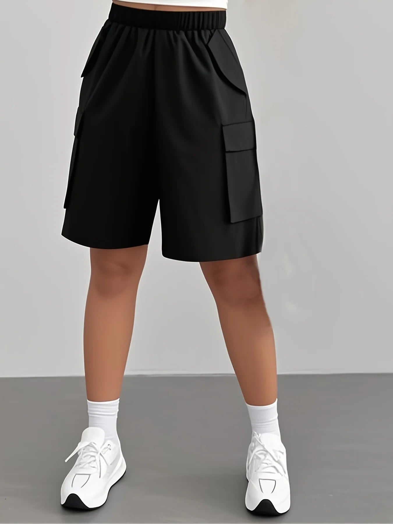 European and American plus size women's black elastic waist multi-pocket cargo shorts; loose wide-leg side 3D large pocket casual sports knee-length