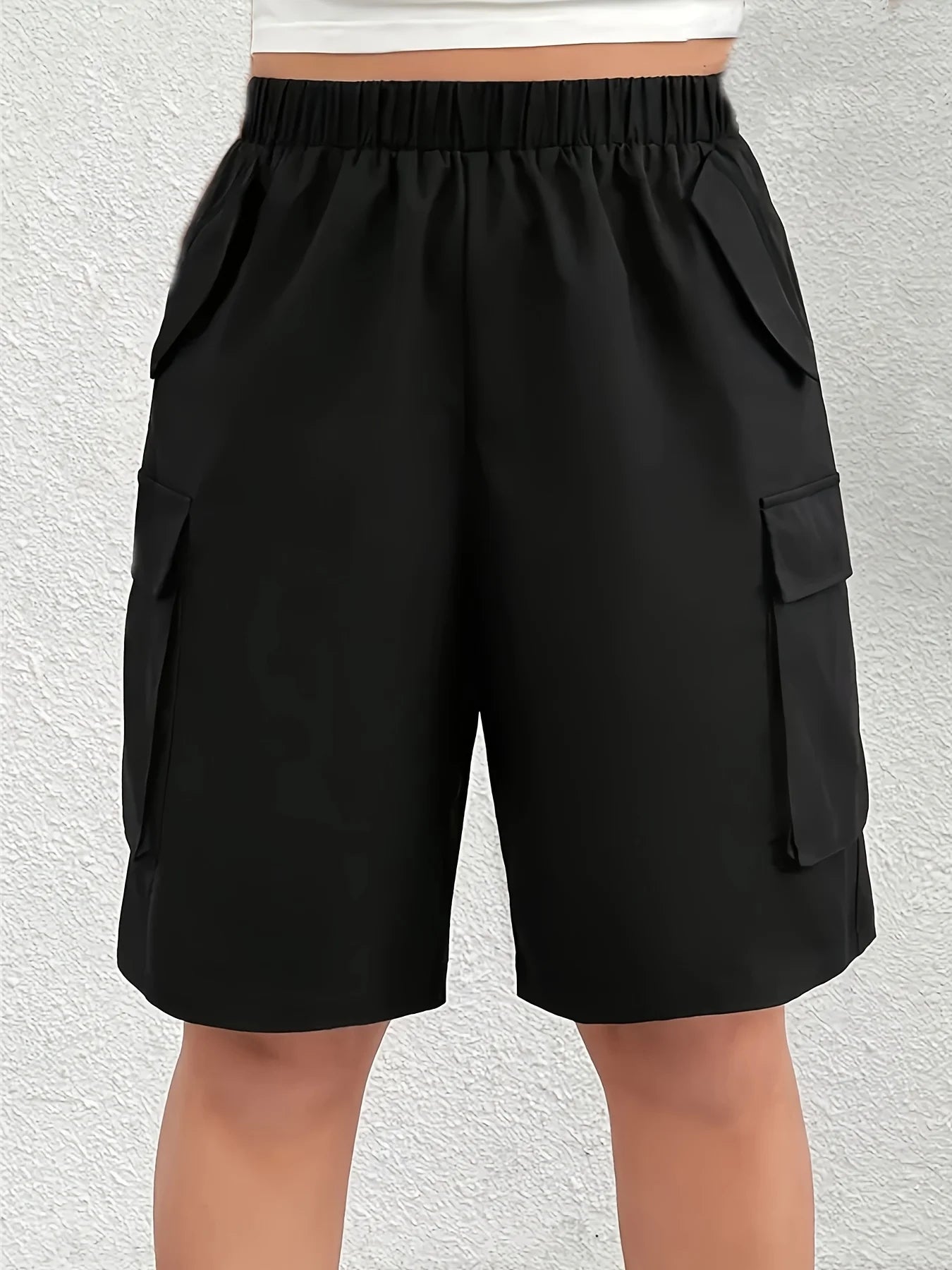 European and American plus size women's black elastic waist multi-pocket cargo shorts; loose wide-leg side 3D large pocket casual sports knee-length