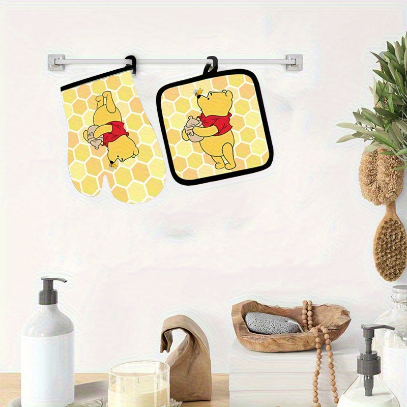 Winnie the Pooh Kitchen Set, including a cartoon apron, heat-resistant gloves, and a heat-resistant mat, bringing joy to your culinary creations.,  Playful Kitchenware, Cheerful Kitchen, Kitchen Gift Set